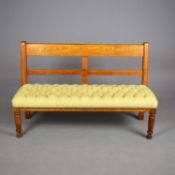 EARLY 20TH CENTURY OAK STATION BENCH.
