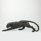 SCULPTURAL PROWLING LEOPARD.