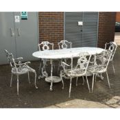 GARDEN TABLE AND SET OF SIX ARMCHAIRS (7).