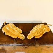 PAIR OF GILT METAL TROPICAL LEAF SERVING DISHES.