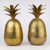 PAIR OF GILT METAL PINEAPPLE JARS.