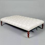 LARGE HEARTH STOOL WITH BUTTONED NEUTRAL LINEN UPHOLSTERY ON TURNED SUPPORTS