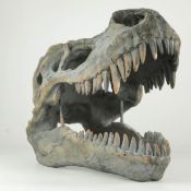 WALL MOUNTING FAUX T REX FOSSIL BUST.