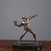 CONTEMPORARY SCHOOL SCULPTURAL STUDY OF MAN THROWING FLOWERS.