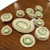 AN ART DECO GRAYS POTTERY 'SUN BUFF' PART DINNER SERVICE.