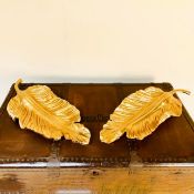 PAIR OF GILT METAL TROPICAL LEAF SERVING DISHES.