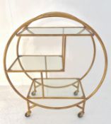 ART DECO STYLE GILT METAL AND GLASS COCKTAIL TROLLEY