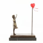 CONTEMPORARY SCHOOL SCULPTURAL STUDY OF GIRL WATCHING BALLON FLOAT AWAY.