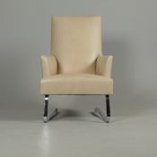 ARMCHAIR, IN PUTTY COLOURED LEATHER