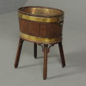 GEORGE III MAHOGANY AND BRASS BOUND WINE COOLER