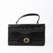 A HERMES BLACK LEATHER HANDBAG.