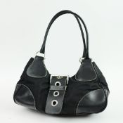 A PRADA BLACK LEATHER AND CANVAS MOON SHOULDER BAG.