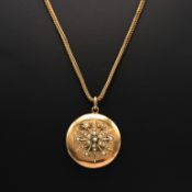A 9CT GOLD CHAIN AND LOCKET PENDANT.