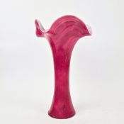 A LARGE RUBY COLOURED GLASS VASE.