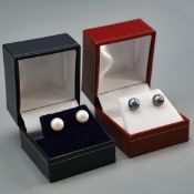 TWO PAIRS OF PEARL STUD EARRINGS.