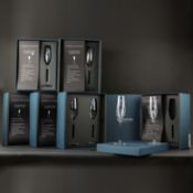 WATERFORD 'ELEGANCE COLLECTION', A SET OF TWELVE CHAMPAGNE FLUTES.