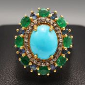 A MULTIPLE GEMSTONE SET DRESS RING.
