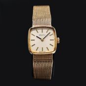 A 9CT GOLD ZENITH WRISTWATCH.