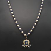 A CULTURED PEARL AND SODALITE BEAD PENDANT NECKLACE.