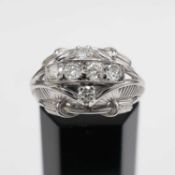 A GENTS WHITE METAL DIAMOND SET DRESS RING