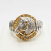 A PLATINUM AND YELLOW METAL DIAMOND SET DRESS RING