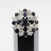 A 9CT GOLD SAPPHIRE AND DIAMOND DRESS RING