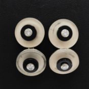 A PAIR OF PLATINUM ONYX AND DIAMOND SET CUFFLINKS