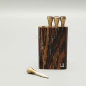AN ALFRED DUNHILL SET OF .925 SILVER GOLF TEE DECISION STRAWS.