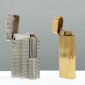 A CARTIER GOLD PLATED LIGHTER AND A DUPONT LIGHTER
