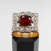AN 18CT GOLD RUBY AND DIAMOND SET GENTS DRESS RING