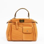 FENDI PEEKABOO MINI POCKETS LEATHER BAG IN ORANGE