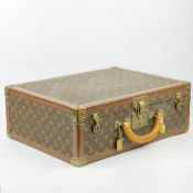 A LOUIS VUITTON BISTEN SUITCASE.