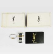 YVES SAINT LAURENT, A CIGARETTE LIGHTER AND A MATCHING KEY RING.