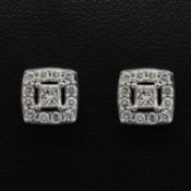 A PAIR OF DIAMOND CLUSTER STUD EARRINGS