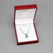 A PLATINUM EMERALD AND DIAMOND PENDANT NECKLACE