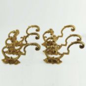 A SET OF SIX FRENCH GILT CURTAIN TIEBACK/COAT HOOKS. (6).