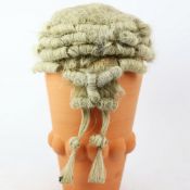 A 19TH CENTURY HORSEHAIR BARRISTERS WIG.