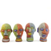 A SET OF FOUR CAMEROON BAMILEKE BEADED HEADS. (4).