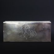 A MEXICAN STERLING SILVER CIGARETTE BOX.
