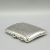 A GEORGE V SILVER CIGARETTE CASE.