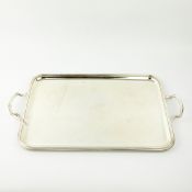 A LARGE SILVER PLATED SERVING TRAY.