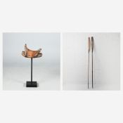 ANTIQUE CHINESE WOOD AND IRON SADDLE ON METAL STAND AND TWO OARS (3).