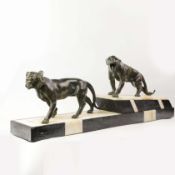 A FRENCH ART DECO LION AND LIONESS SCULPTURE.