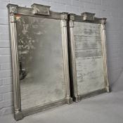 PAIR OF WALL MIRRORS WITH SILVERED FRAMES AND DISTRESSED EFFECT MIRROR PLATES.