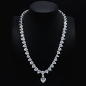 A STERLING SILVER FAUX DIAMOND PENDANT NECKLACE.