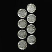 A SET OF EIGHT WALLACE STERLING SILVER COASTERS.