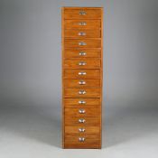 MID 20TH CENTURY HABERDASHERY TALL CHEST.