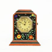 A SILVER ENAMEL INLAID STRUT CLOCK.