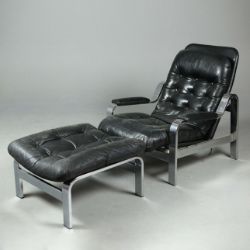 ATTRIBUTED TO SELIG LOUNGE CHAIR AND STOOL.