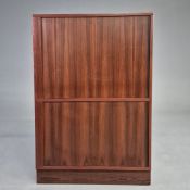 1970s DANISH DRINKS CABINET WITH SLIDING DOORS.